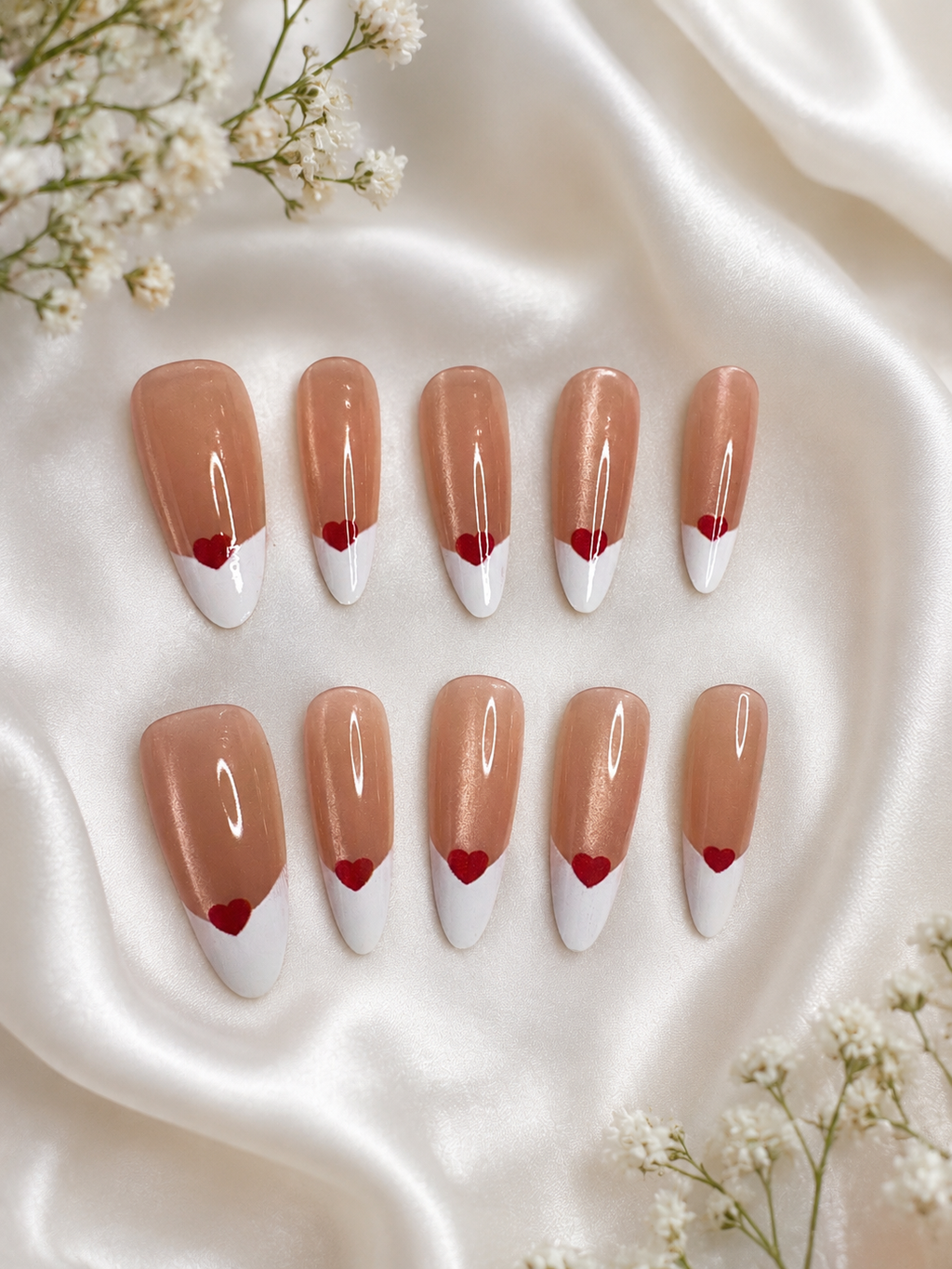 white French manicure with a heart